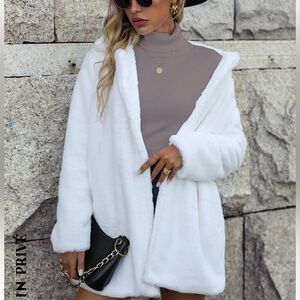 White fuzzy coat